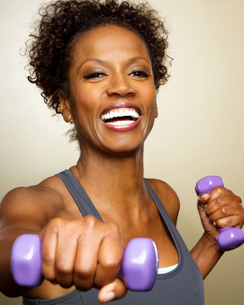 Woman Lifting Wight - Urinary Incontinence